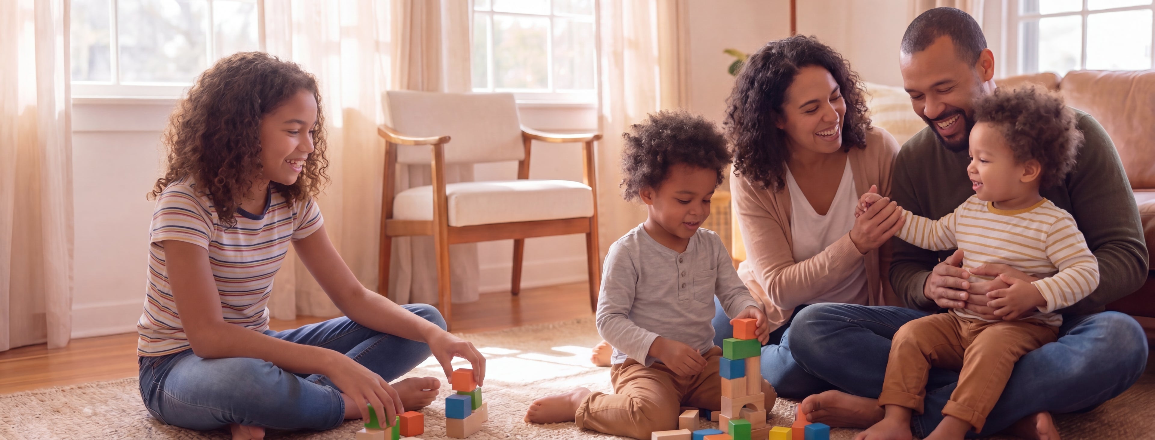 Family playing together at home, supporting Autistic and ADHD children through connection and a neuro-affirming home environment